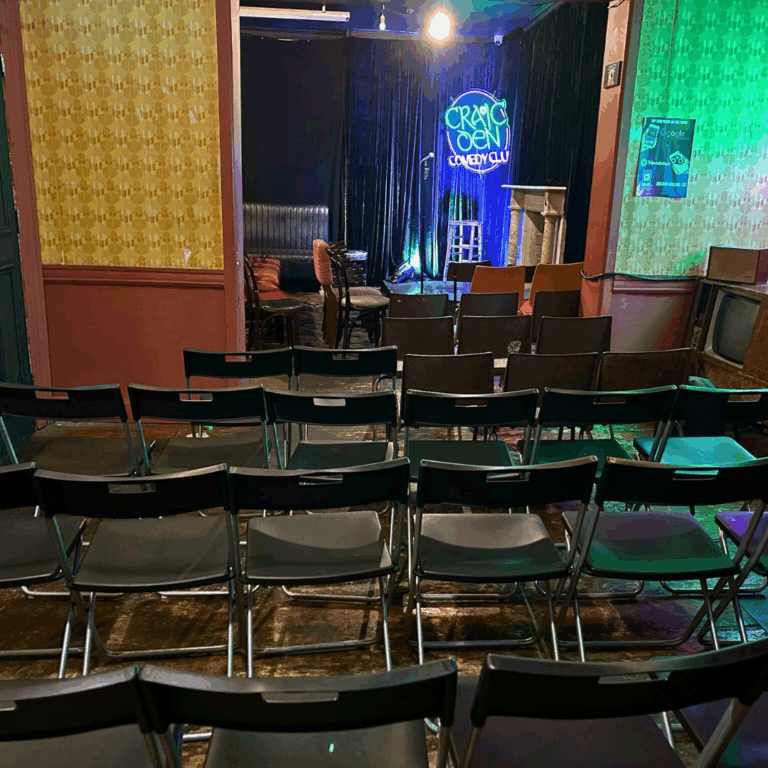 Craic Den Comedy Club main stage with chairs facing forward