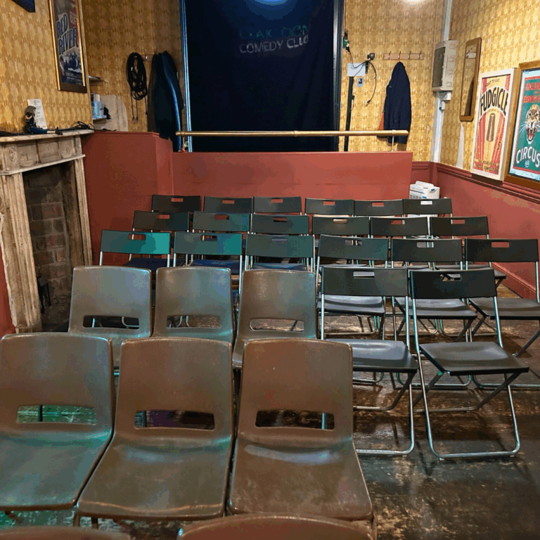 Craic Den Comedy Club audience seating of assorted chairs in rows